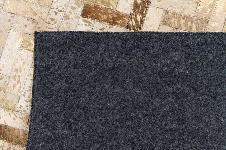 5' 3 x 7' 7 Cowhide Stocks Rug