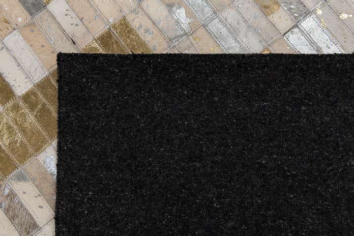 4' 10 x 8' 2 Cowhide Stocks Rug