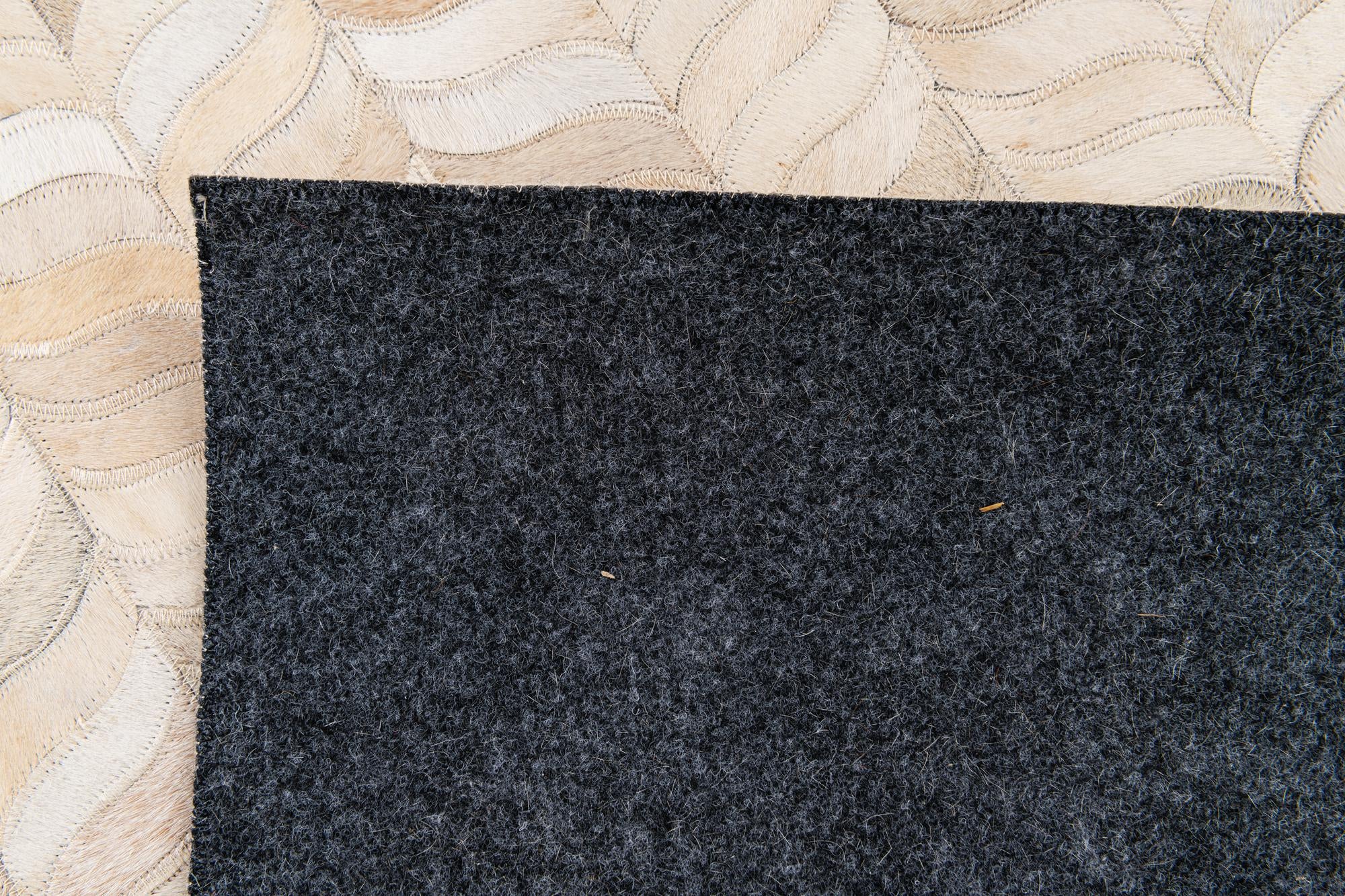 5' 9 x 7' 10 Cowhide Stocks Rug