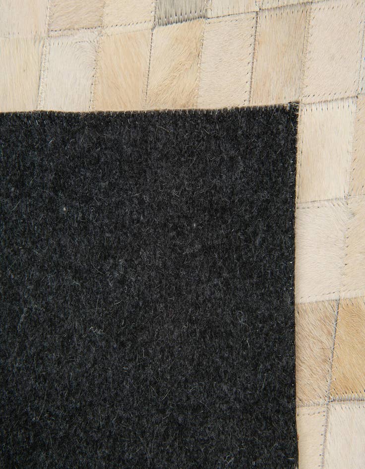 Detail image of 6' x 8' 11 Cowhide Stocks Rug