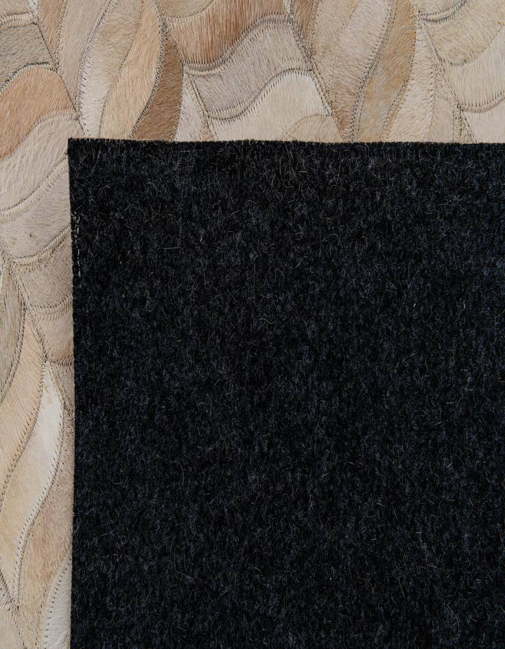 Detail image of 6' 8 x 9' 8 Cowhide Stocks Rug