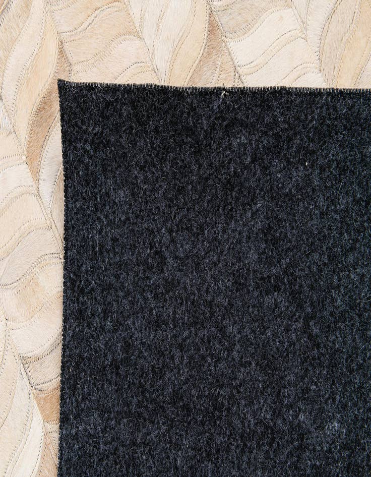 Detail image of 6' 8 x 9' 9 Cowhide Stocks Rug