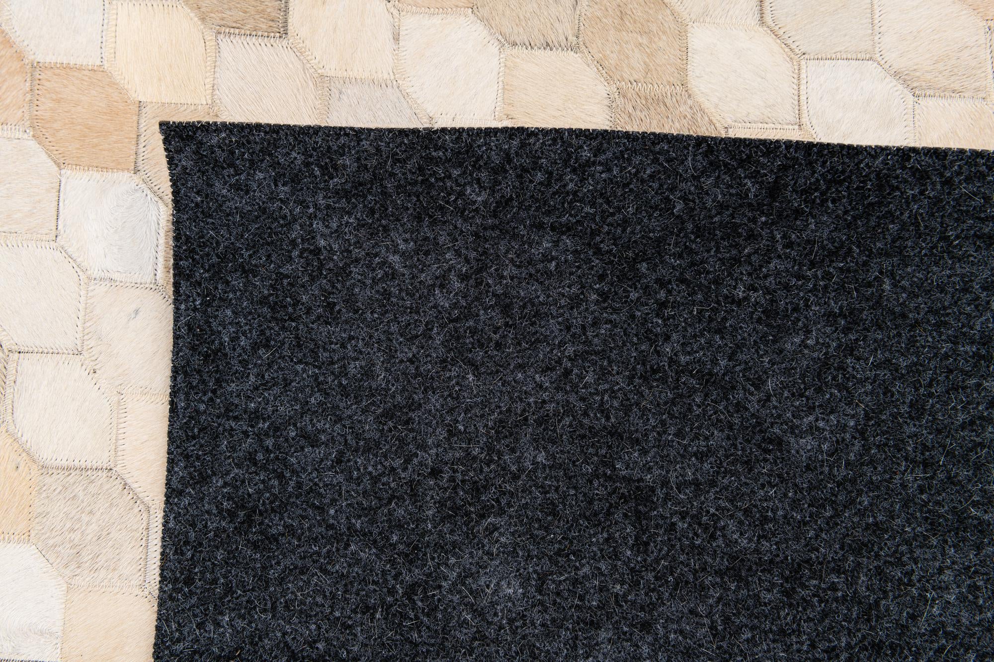6' 8 x 10' Cowhide Stocks Rug