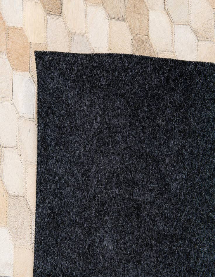 Detail image of 6' 8 x 10' Cowhide Stocks Rug