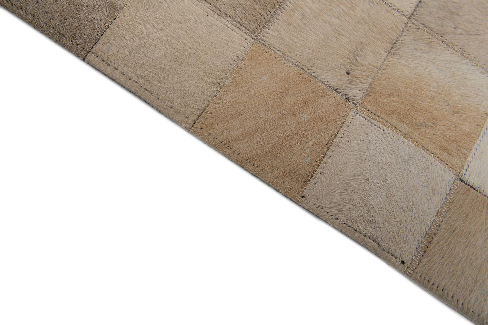 6' 8 x 9' 9 Cowhide Stocks Rug