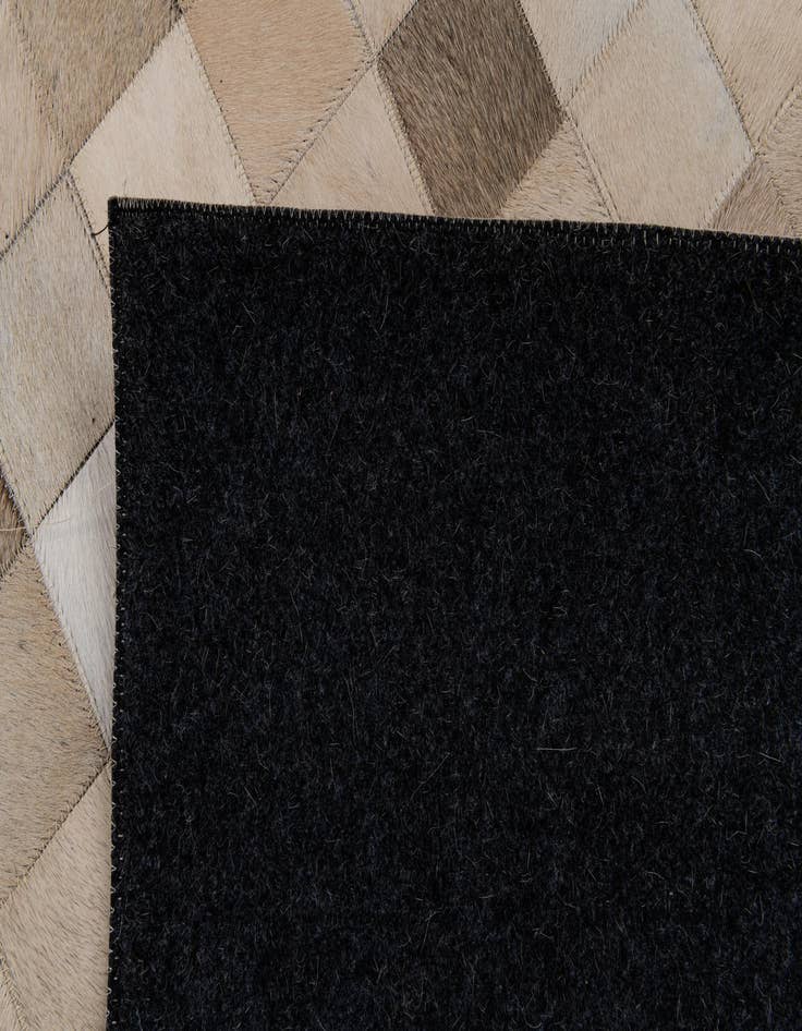 Detail image of 6' 8 x 9' 9 Cowhide Stocks Rug