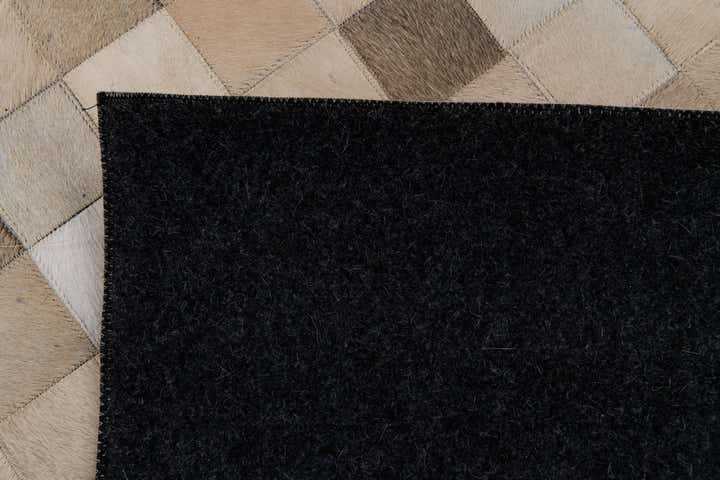 6' 8 x 9' 9 Cowhide Stocks Rug