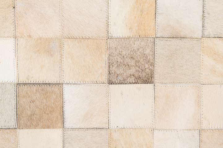 6' 8 x 9' 11 Cowhide Stocks Rug