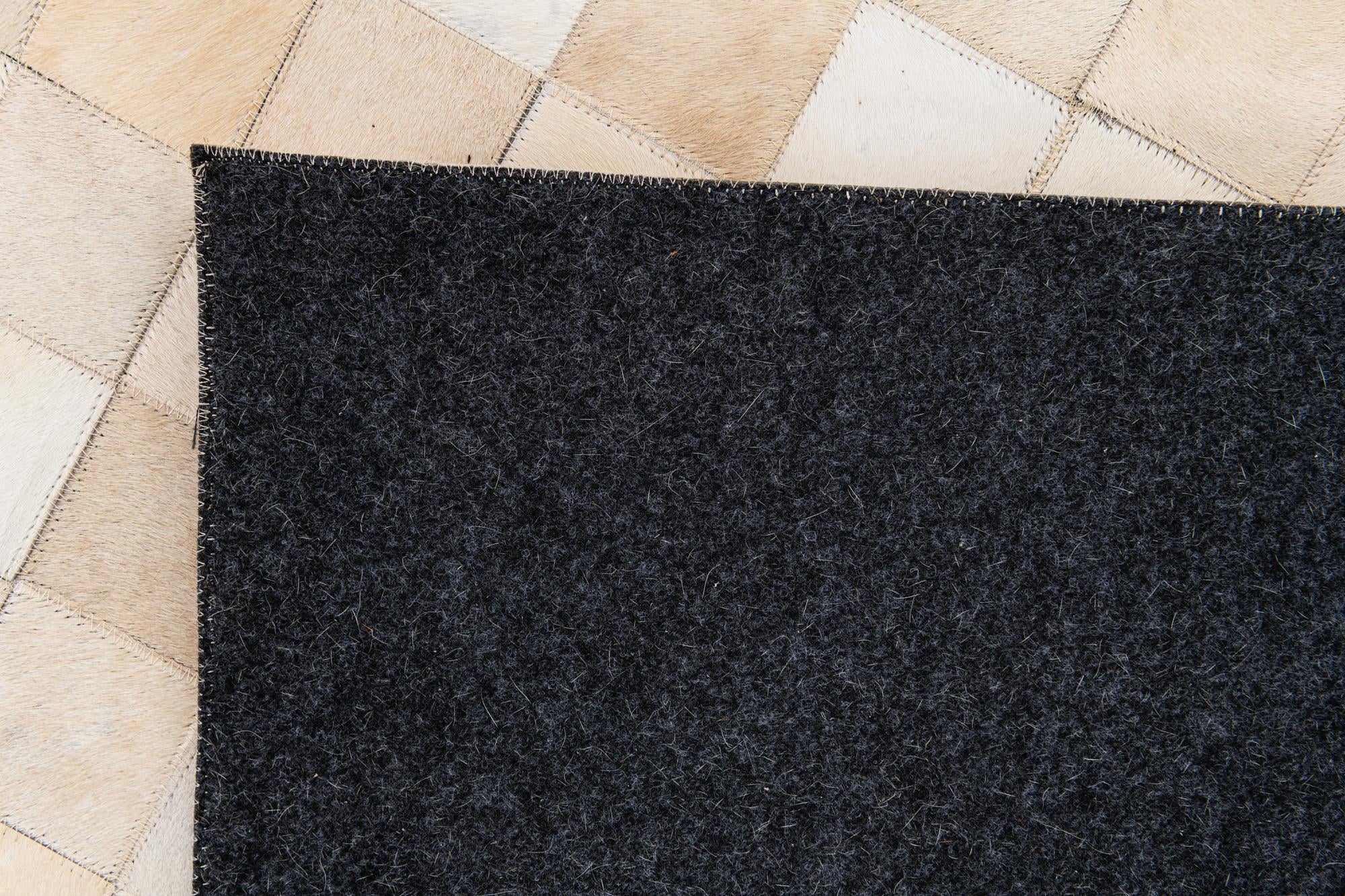 6' 8 x 9' 11 Cowhide Stocks Rug