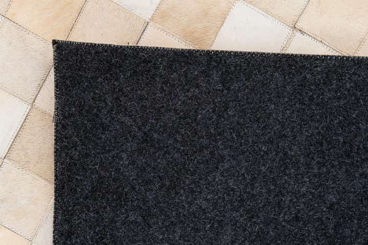 6' 8 x 9' 11 Cowhide Stocks Rug