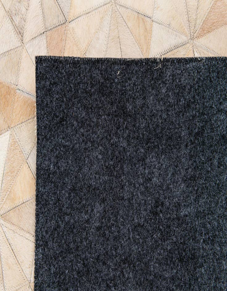 Detail image of 6' 9 x 9' 8 Cowhide Stocks Rug