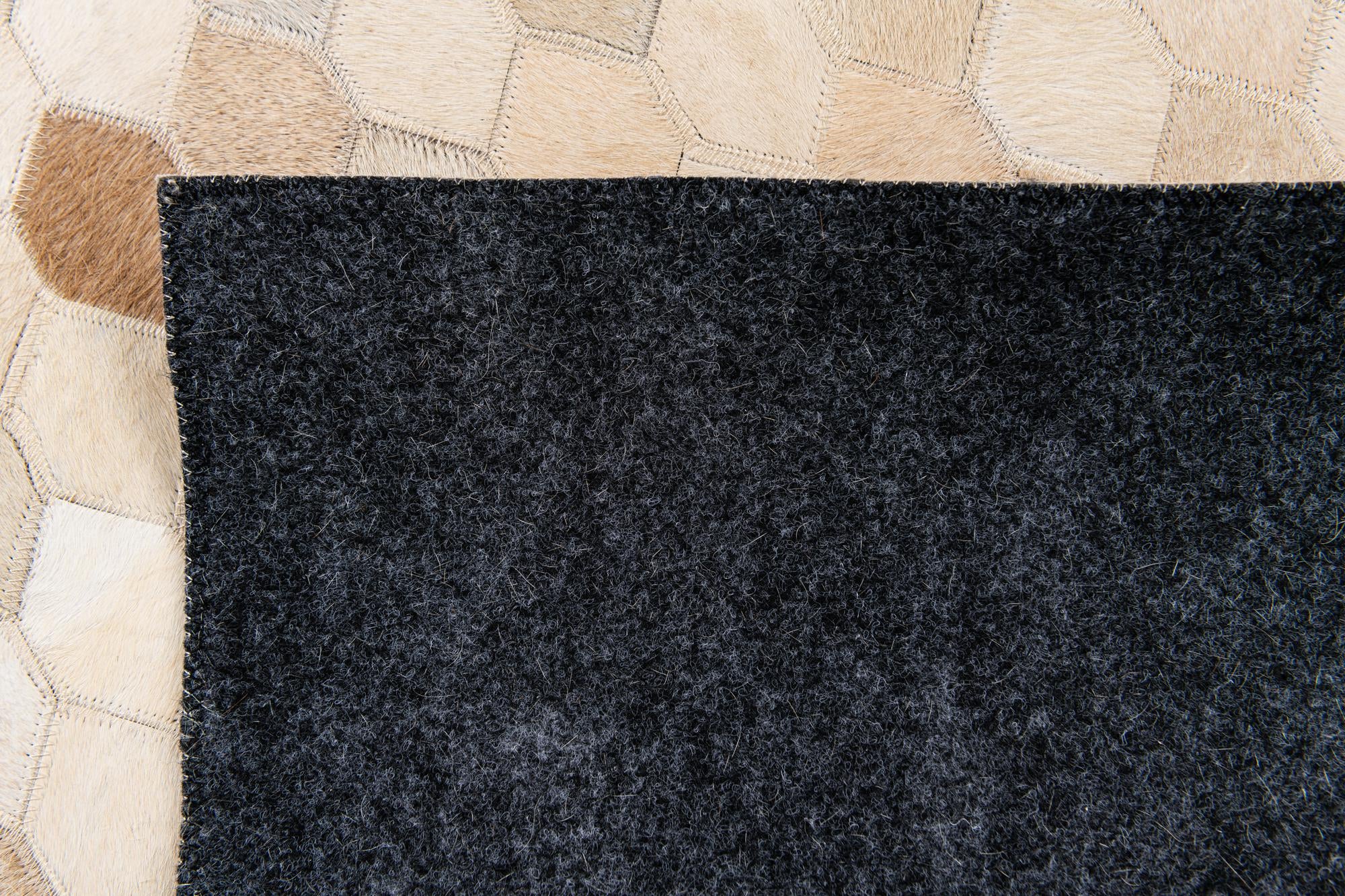 4' 8 x 6' 8 Cowhide Stocks Rug