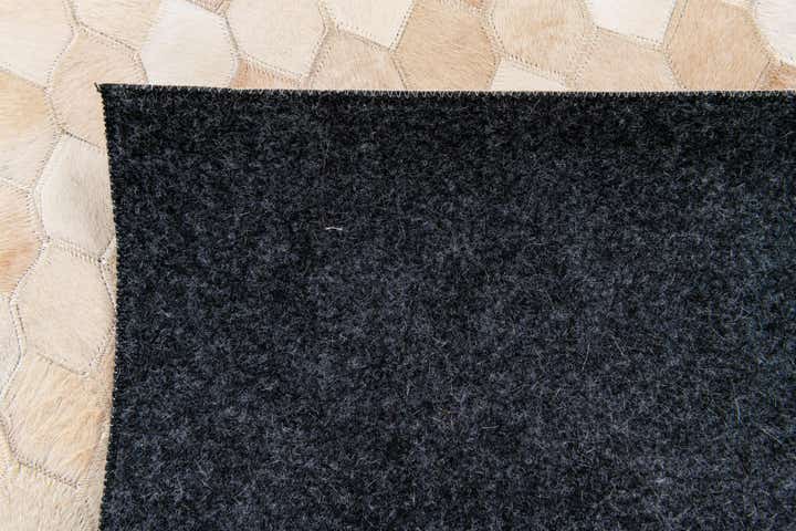 4' 8 x 6' 7 Cowhide Stocks Rug