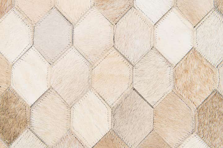 4' 8 x 6' 7 Cowhide Stocks Rug