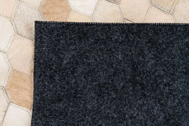 4' 8 x 6' 7 Cowhide Stocks Rug