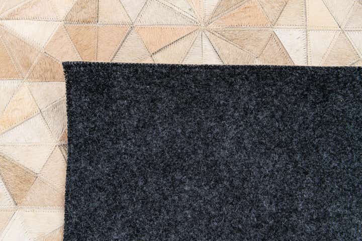 4' 8 x 6' 7 Cowhide Stocks Rug