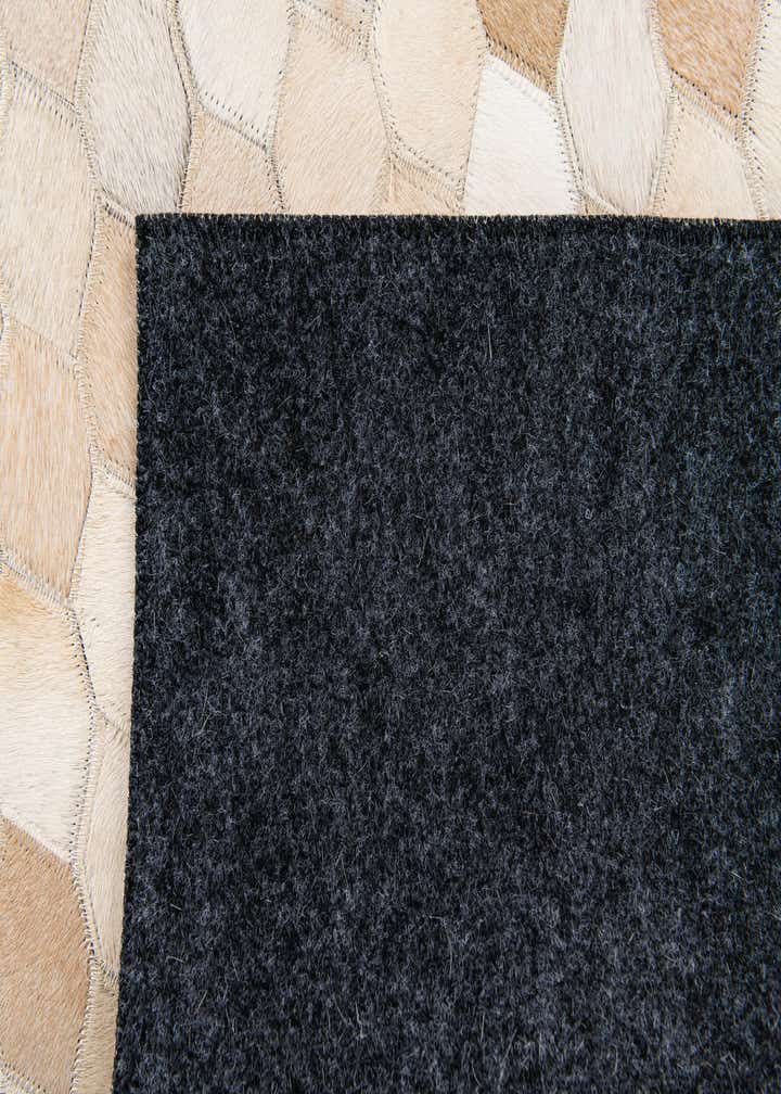4' 8 x 6' 7 Cowhide Stocks Rug
