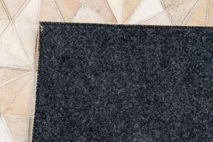 4' 8 x 6' 5 Cowhide Stocks Rug