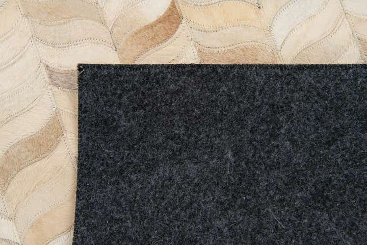 3' 11 x 5' 10 Cowhide Stocks Rug