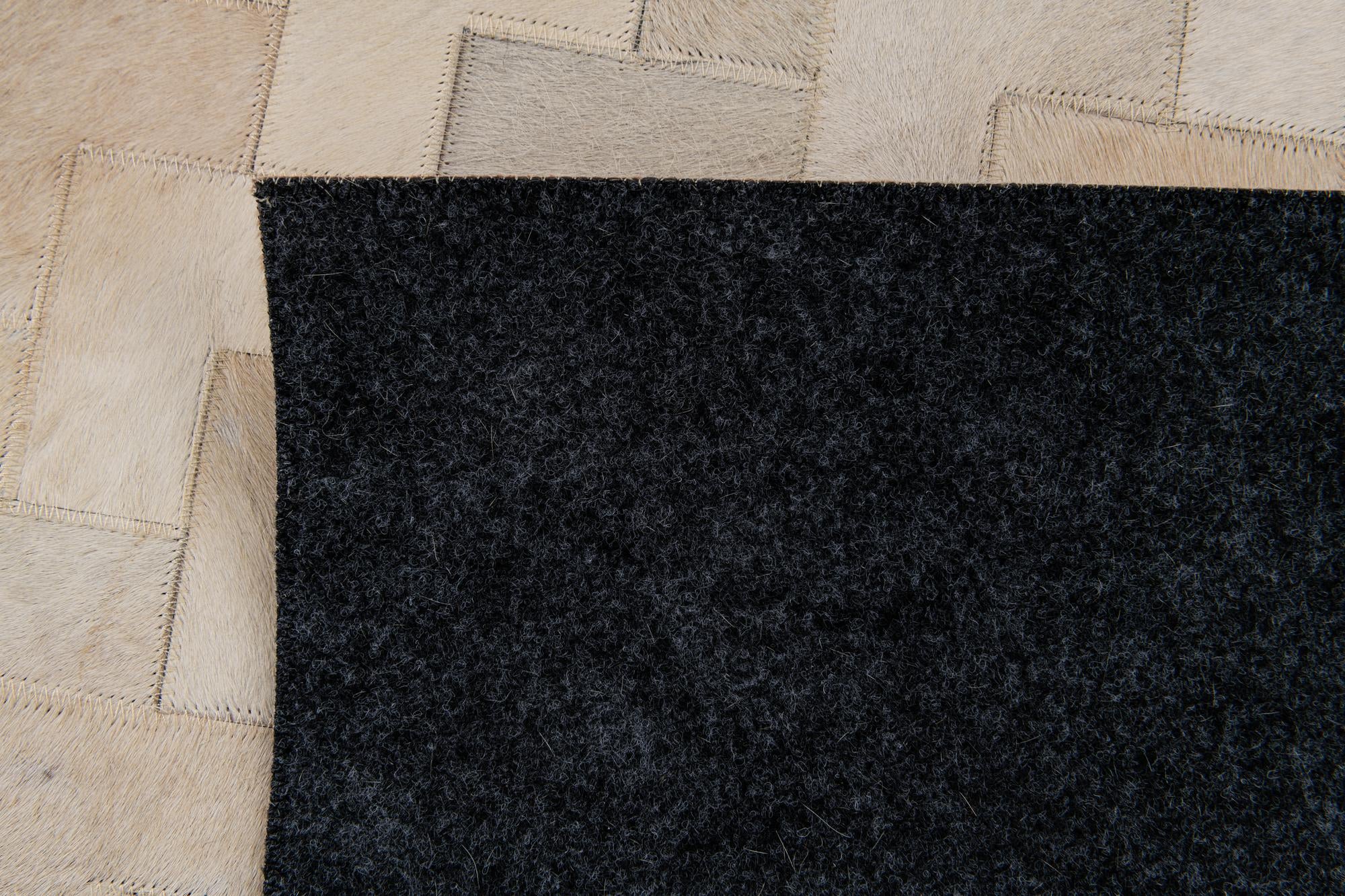 4' 1 x 5' 11 Cowhide Stocks Rug