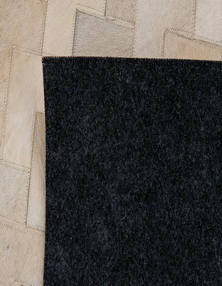 Detail image of 4' 1 x 5' 11 Cowhide Stocks Rug