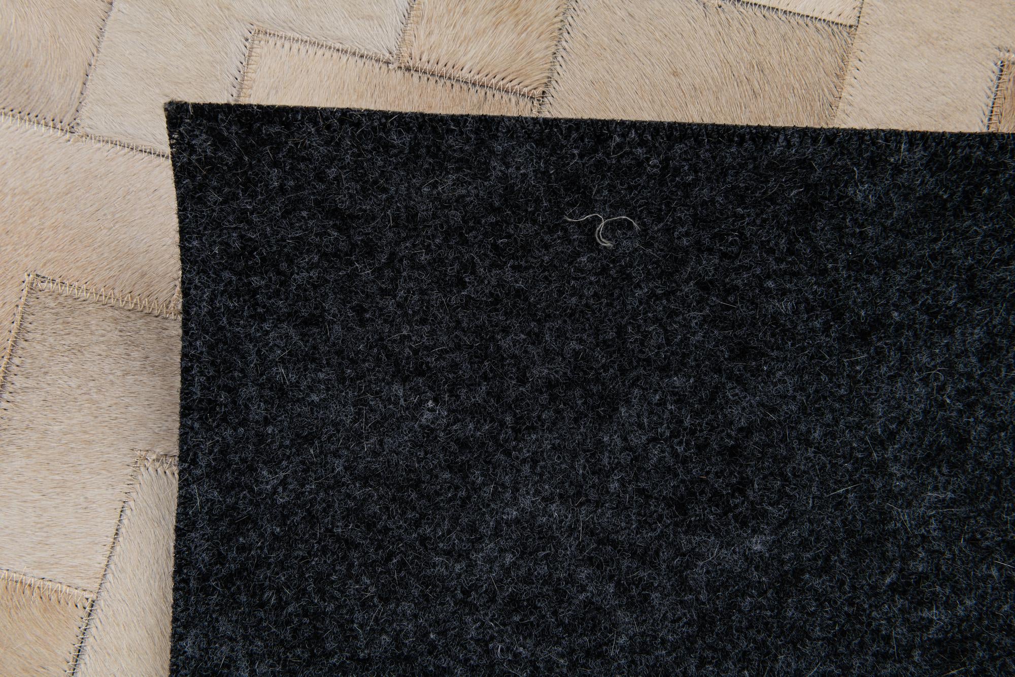 4' 1 x 5' 10 Cowhide Stocks Rug