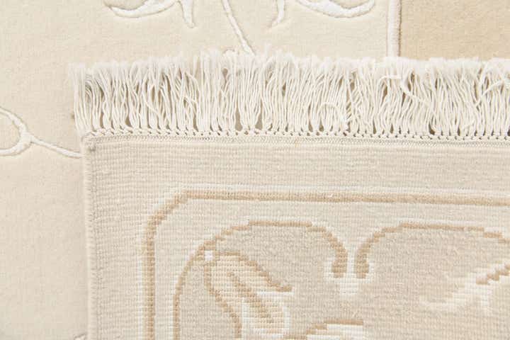 7' x 9' 6 Hand Knotted Darya Wool Rug