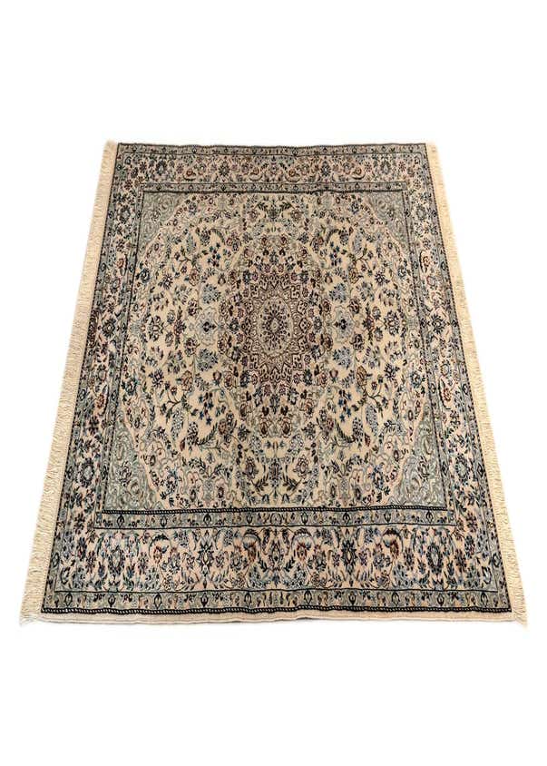4' 2 x 6' 1 Nain Rug
