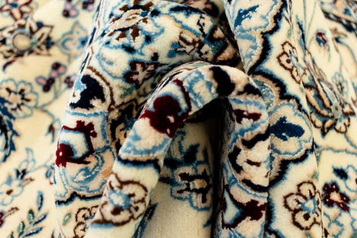 4' 2 x 6' 7 Nain Rug