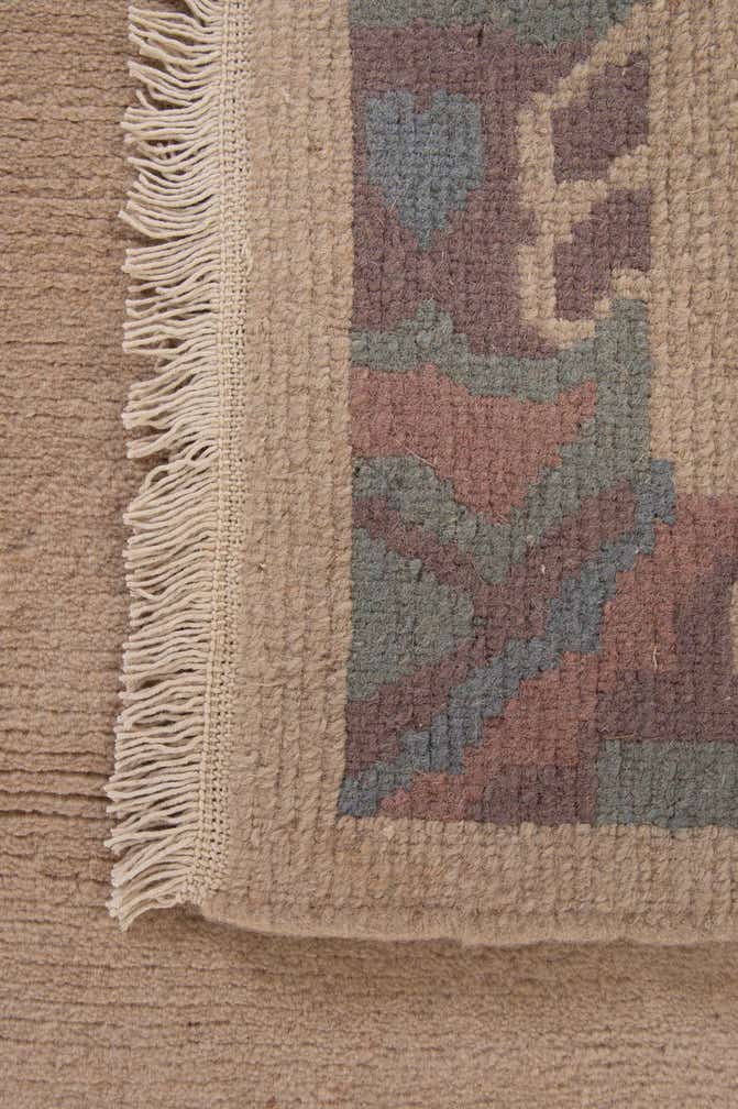3' 11 x 5' 9 Hand Knotted Nepal Wool Rug