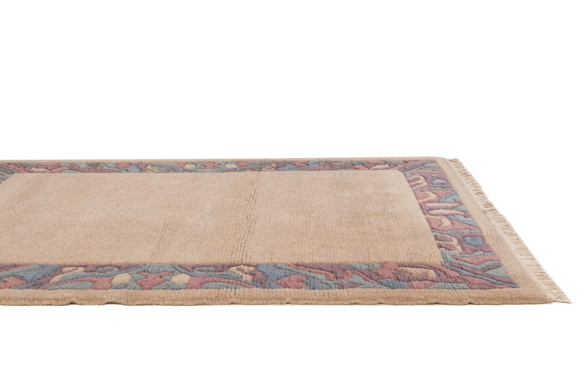3' 11 x 5' 9 Hand Knotted Nepal Wool Rug