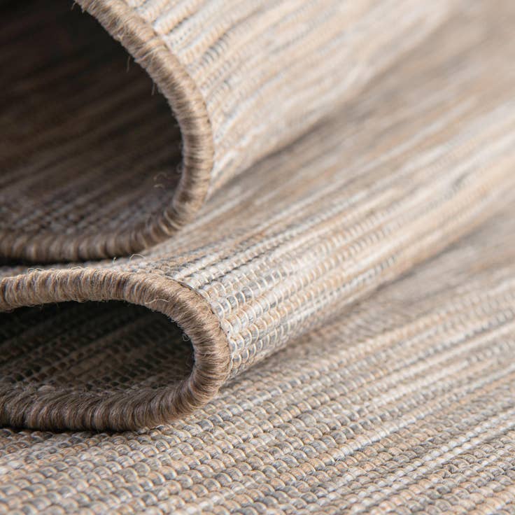Detail image of 9' 4 x 12' Easy-Clean Solid Indoor / Outdoor Rug