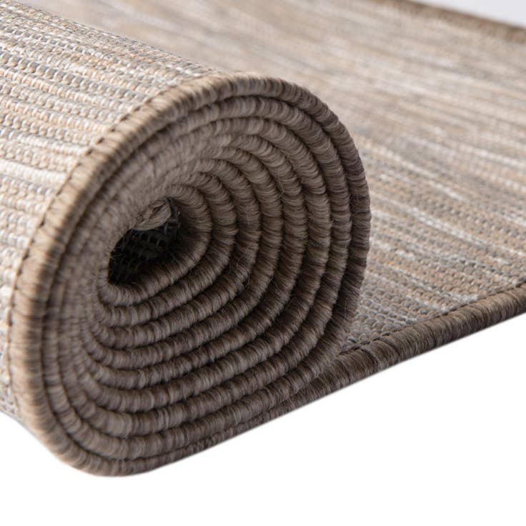 Detail image of 9' 4 x 12' Easy-Clean Solid Indoor / Outdoor Rug