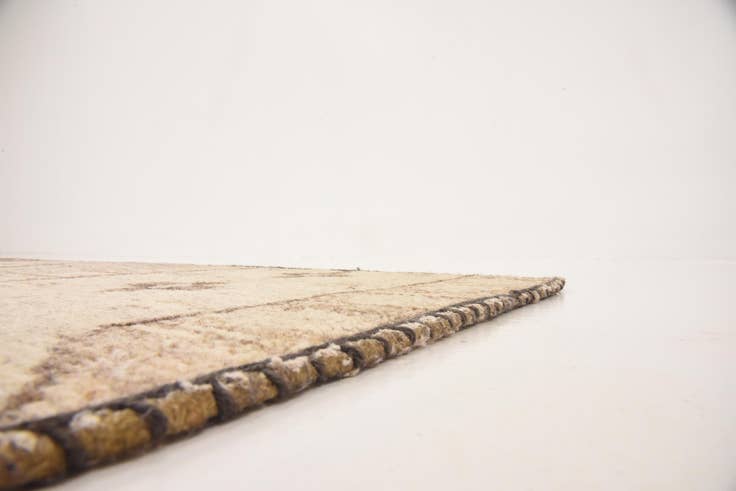 Detail image of 6' 7 x 9' 8 Hand Knotted Patchwork Wool Rug