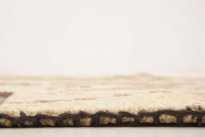 4' x 5' 8 Hand Knotted Patchwork Wool Rug