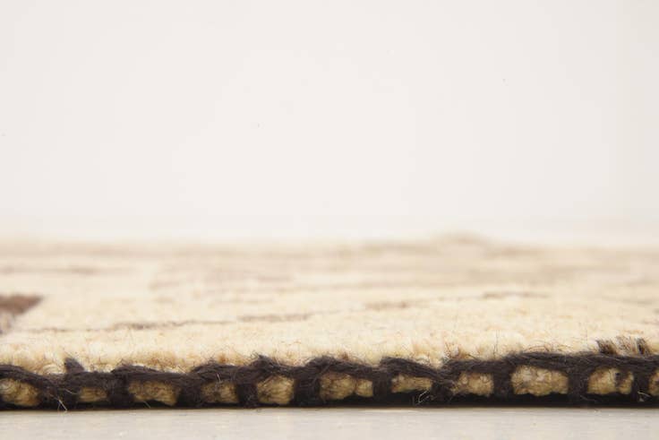 Detail image of 4' x 5' 8 Hand Knotted Patchwork Wool Rug