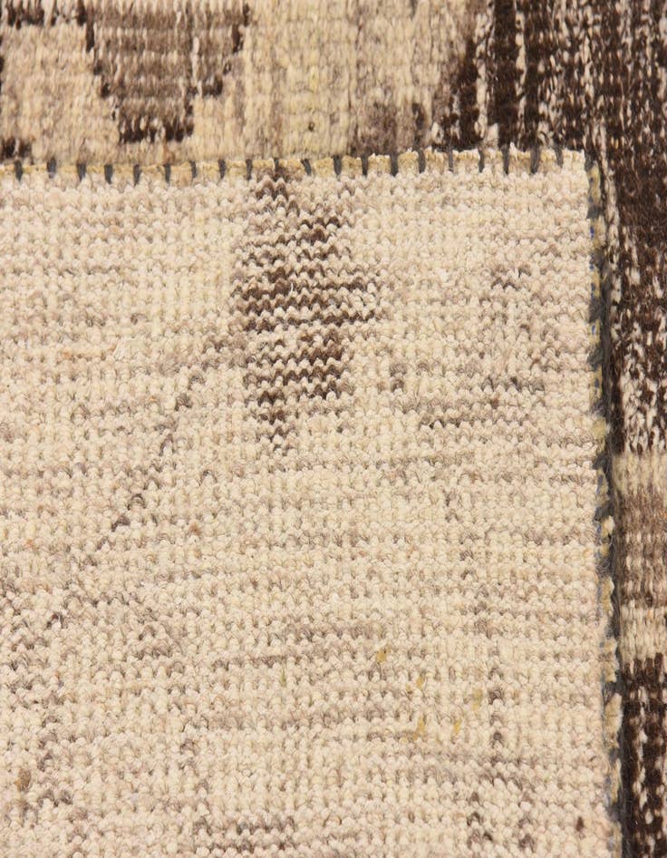 Detail image of 6' 7 x 9' 7  Hand Knotted Patchwork Wool Rug