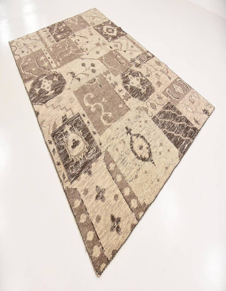 Detail image of 6' 7 x 9' 7  Hand Knotted Patchwork Wool Rug