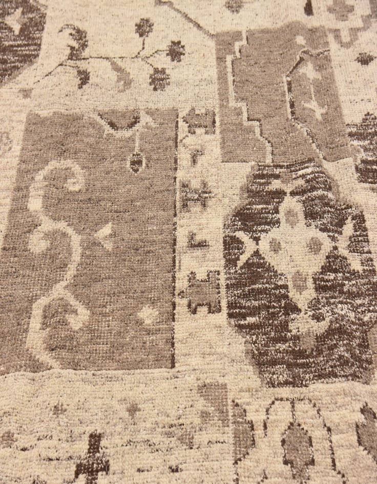 Detail image of 6' 7 x 9' 7  Hand Knotted Patchwork Wool Rug