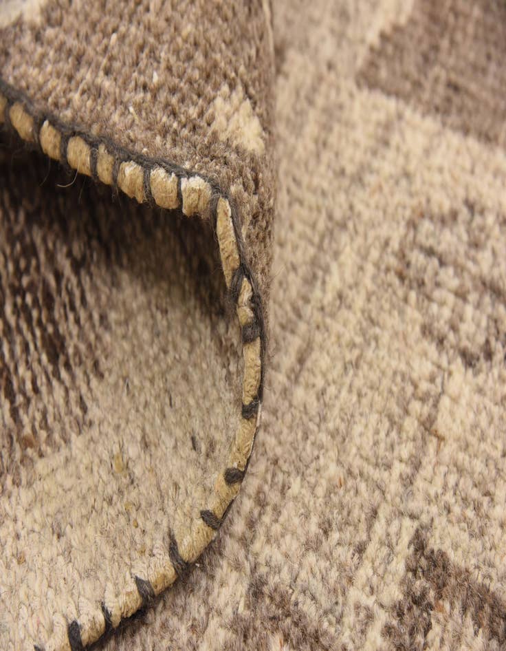 Detail image of 6' 7 x 9' 7  Hand Knotted Patchwork Wool Rug