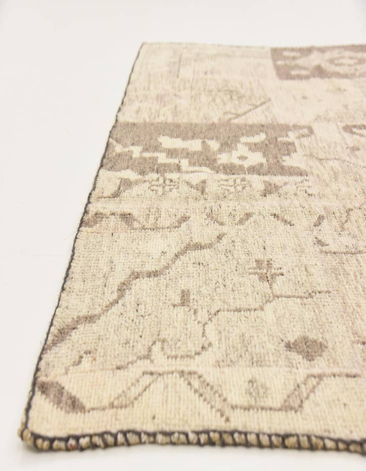 Detail image of 6' 8 x 9' 6  Hand Knotted Patchwork Wool Rug