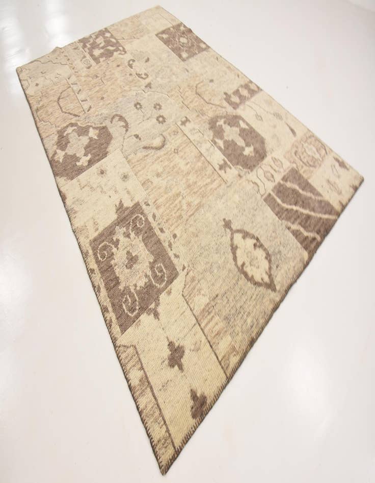 Detail image of 6' 5 x 9' 9 Hand Knotted Patchwork Wool Rug