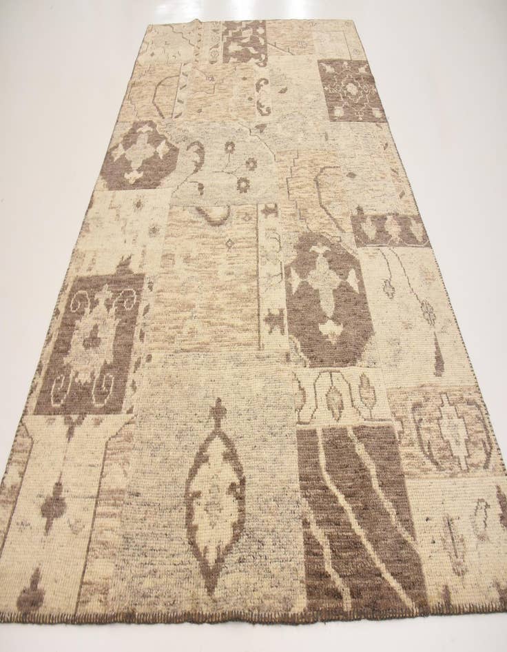 Detail image of 6' 5 x 9' 9 Hand Knotted Patchwork Wool Rug