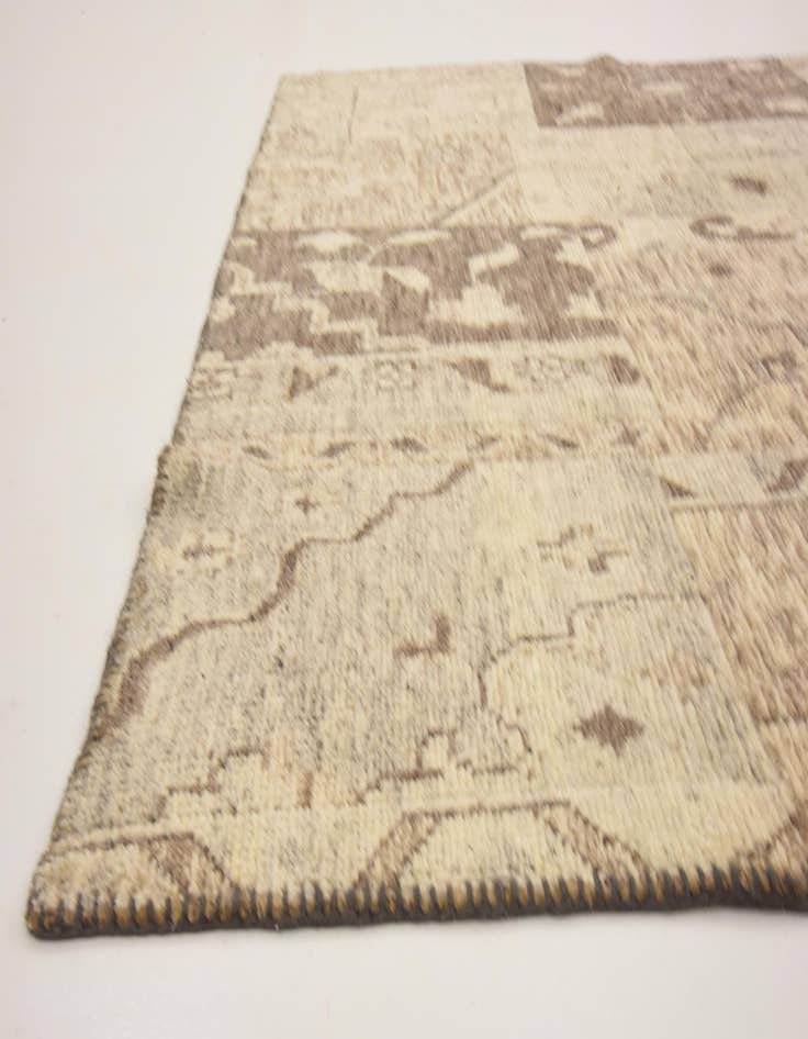 Detail image of 6' 5 x 9' 9 Hand Knotted Patchwork Wool Rug