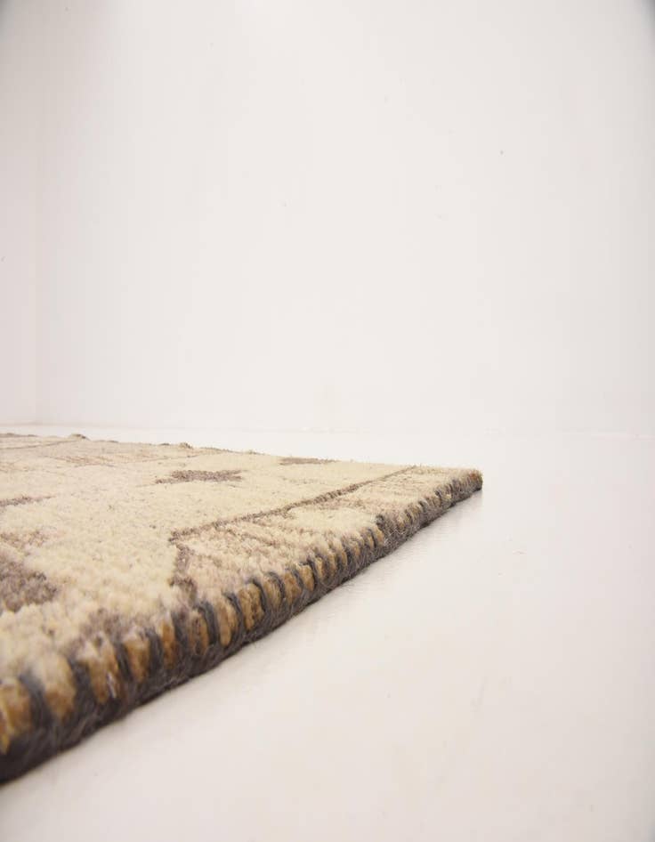 Detail image of 6' 5 x 9' 9 Hand Knotted Patchwork Wool Rug