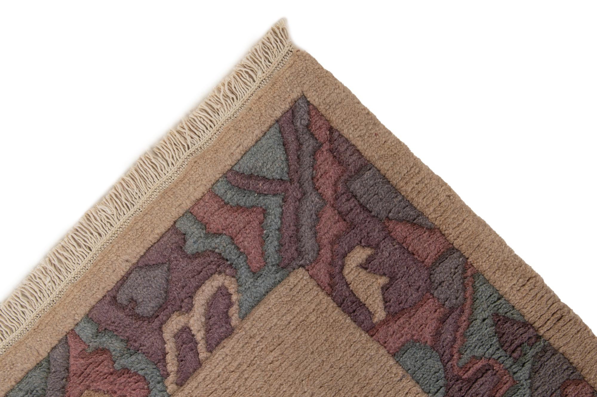 3' 11 x 5' 9 Hand Knotted Tibet Wool Rug