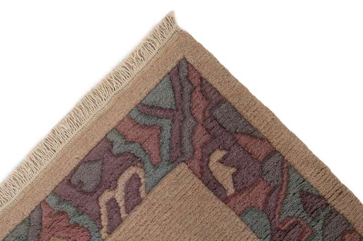 3' 11 x 5' 9 Hand Knotted Tibet Wool Rug