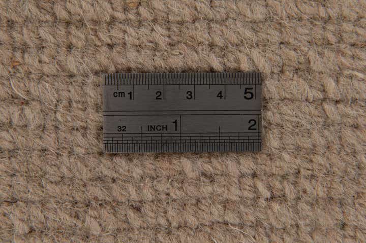 3' 11 x 5' 9 Hand Knotted Tibet Wool Rug