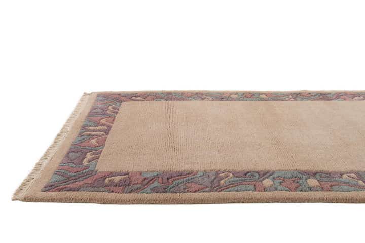 3' 11 x 5' 9 Hand Knotted Tibet Wool Rug