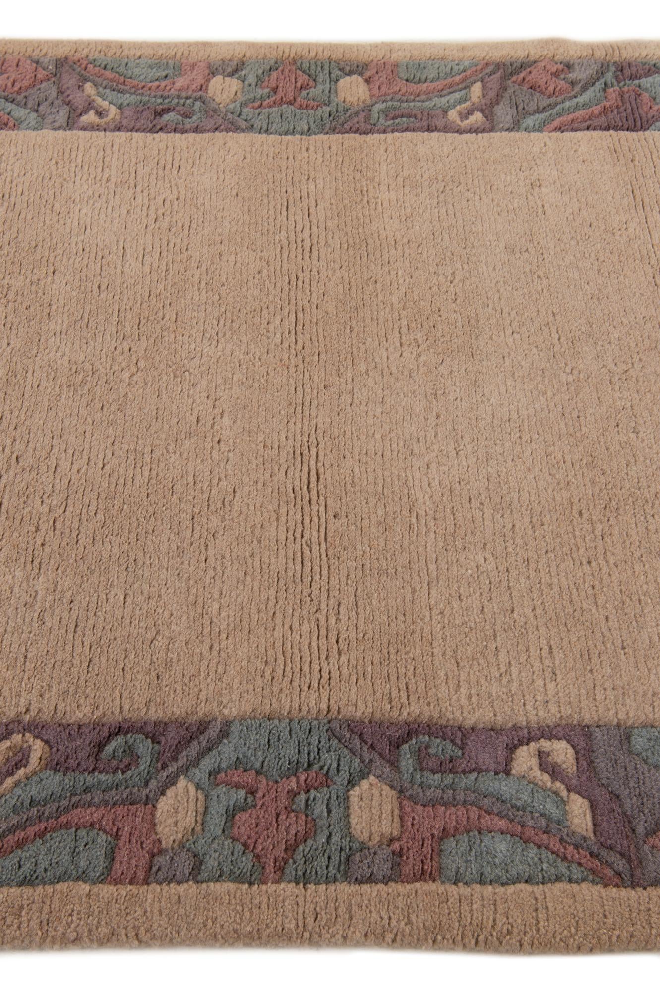 3' 11 x 5' 9 Hand Knotted Tibet Wool Rug